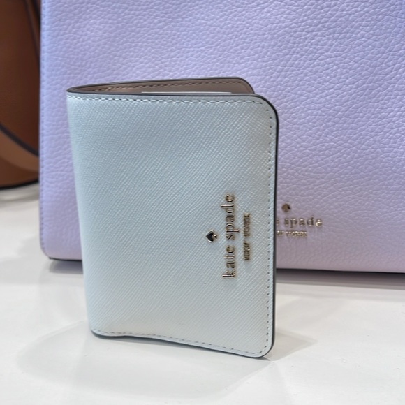Kate Spade Madison Small Bifold Wallet
Meringue 
NWT - Picture 12 of 16